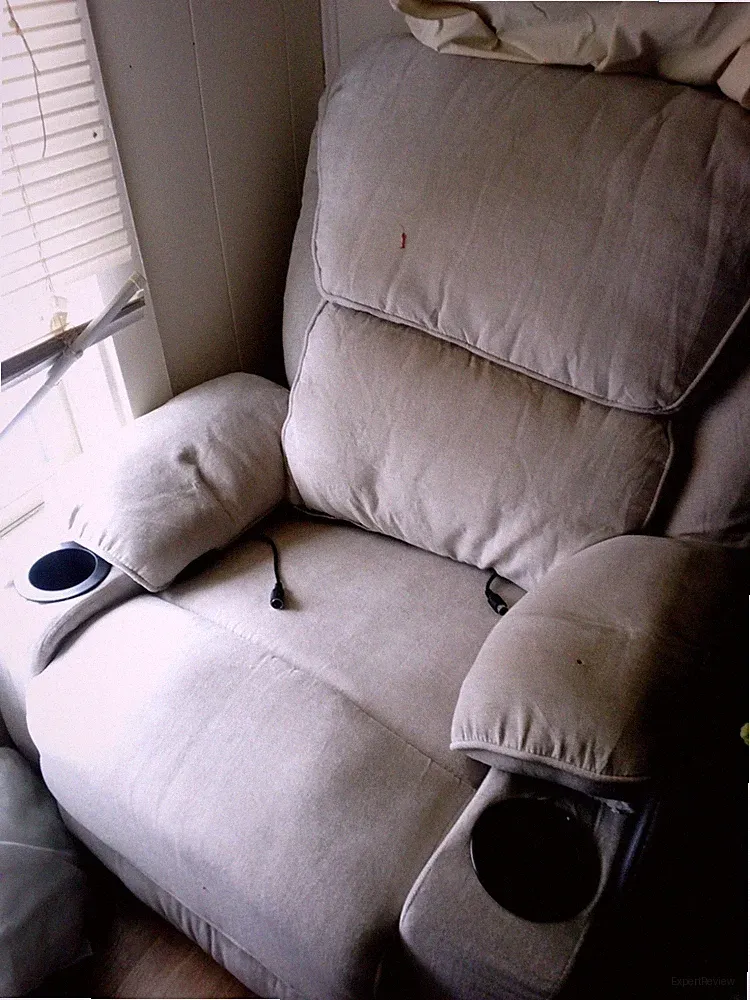 New rocker recliner with swivel and heat and massage and two cup holders